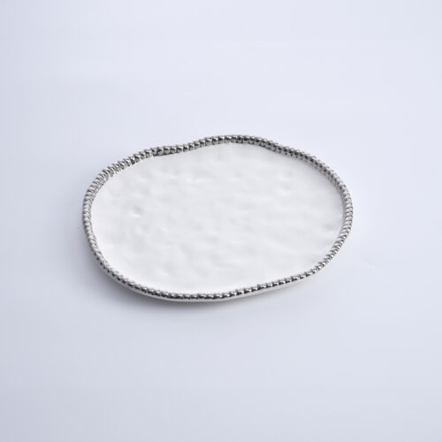 Image by Round Serving Piece
