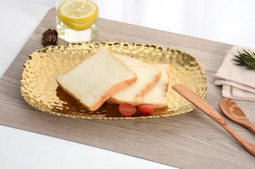 Image by Small, gold serving platter