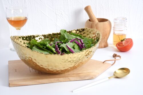 Image by Large, gold oval bowl