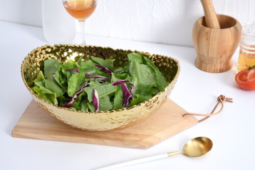 Image by Large, gold oval bowl