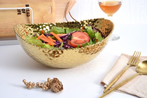 Image by Large, gold oval bowl
