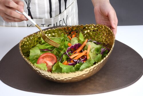 Image by Large, gold oval bowl