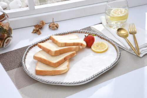 Image by Round Serving Piece