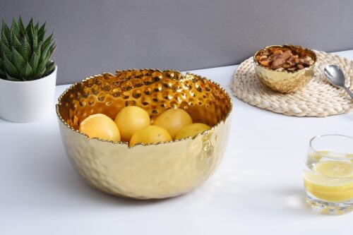Image by Large, gold round bowl