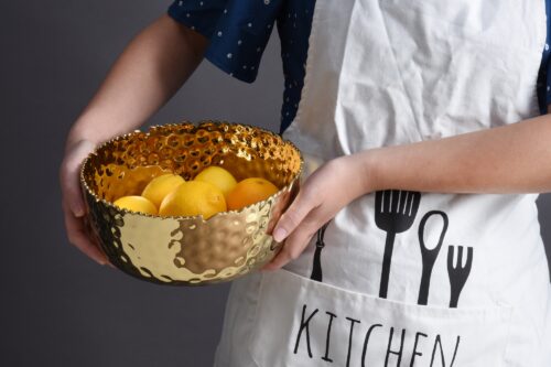 Image by Large, gold round bowl