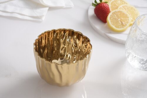 Close-up of the gold-tone porcelain finish.