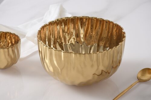 Close-up of the gold-tone porcelain finish.