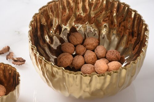 Close-up of the gold-tone porcelain finish.