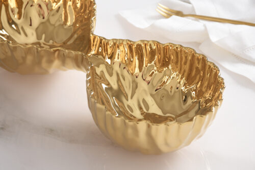 Close-up of the gold-tone porcelain finish.