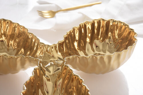 Close-up of the gold-tone porcelain finish.