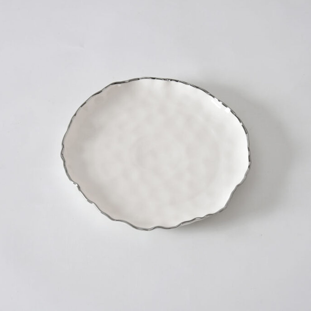 Image by Set of 4 Round Salad Plates