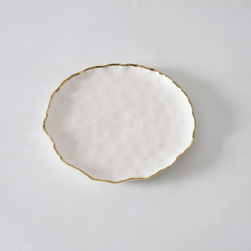 Image by Set of 4 Round Salad Plates